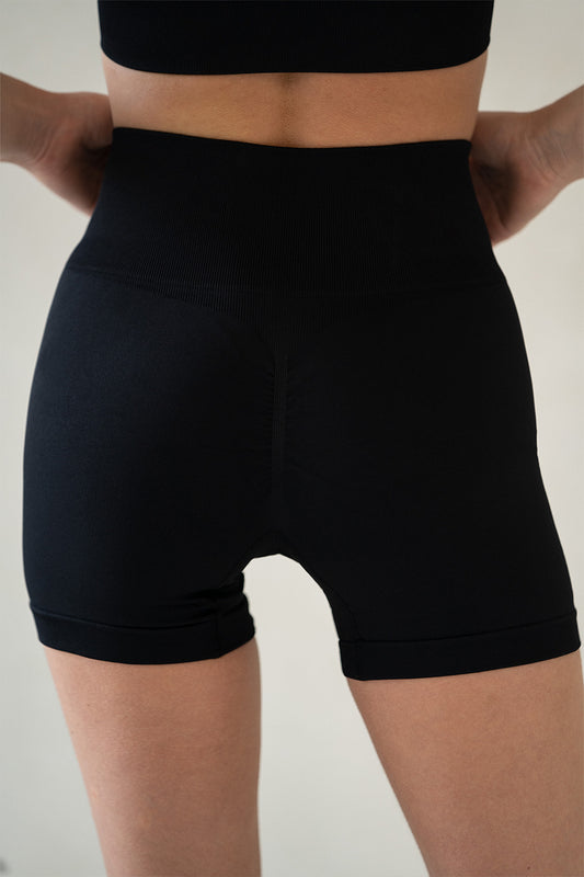 Close-up of the Horizon Legging Shorts from Aurelia Raw showing high waistband and scrunch detail